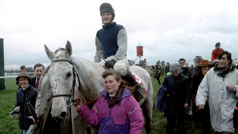 Desert Orchid is led into the winner's enclosure at Kempton Park after his fourth King George win
