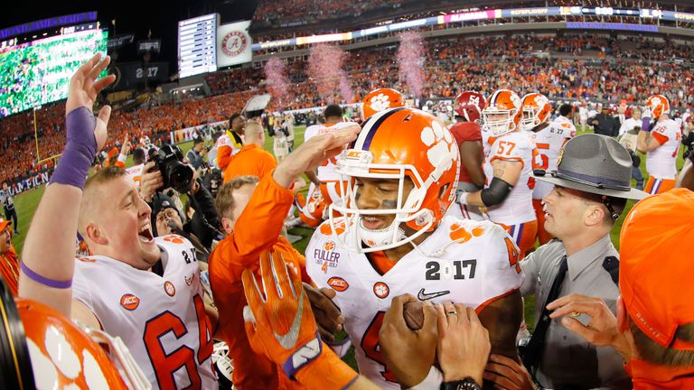 TAMPA, FL - JANUARY 09:  Quarterback Deshaun Watson #4 of the Clemson Tigers celebrates with teammates after defeating the Alabama Crimson Tide 35-31 to wi