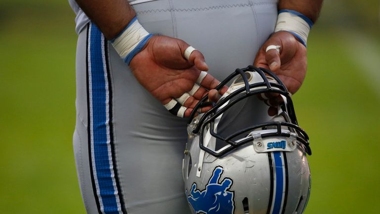 LONDON, ENGLAND - NOVEMBER 01: A Detroit Lions player holds his helmet during the NFL game between Kansas City Chiefs and Detroit Lions at Wembley Stadium 