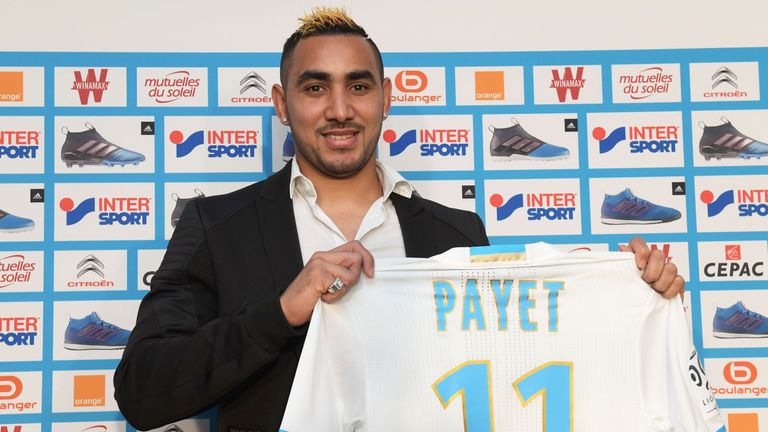 Olympique de Marseille's new forward Dimitri Payet poses with his jersey during a press conference on January 30, 2017 at Robert-Louis Dreyfus Stadium in M