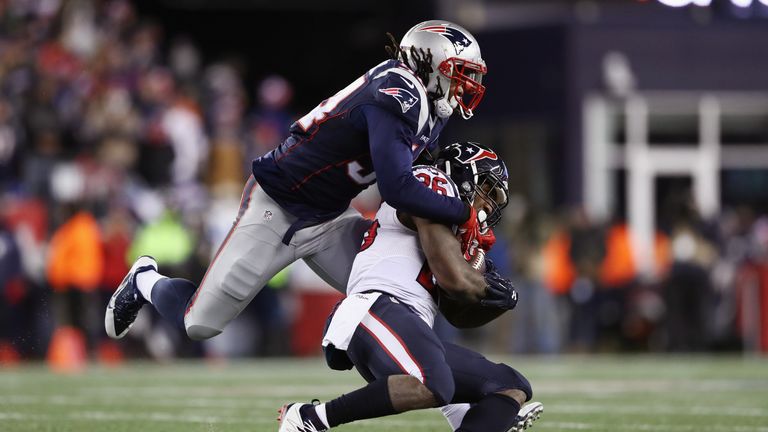FOXBORO, MA - JANUARY 14:  Lamar Miller #26 of the Houston Texans is tackled by Dont'a Hightower #54 of the New England Patriots in the second half during 