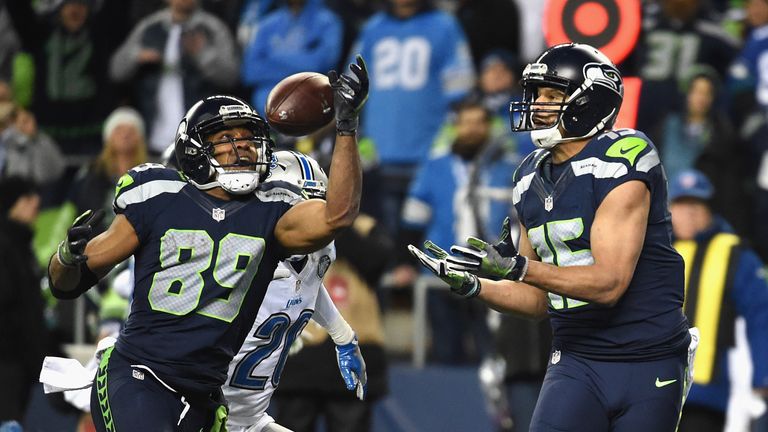 SEATTLE, WA - JANUARY 07:  Doug Baldwin #89 of the Seattle Seahawks scores a 13-yard touchdown during the fourth quarter against the Detroit Lions in the N