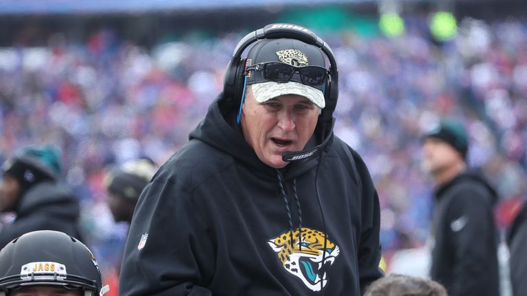 ORCHARD PARK, NY - NOVEMBER 27: Assistant head coach Doug Marrone of the Jacksonville Jaguars talks to his players on the bench during NFL game action agai