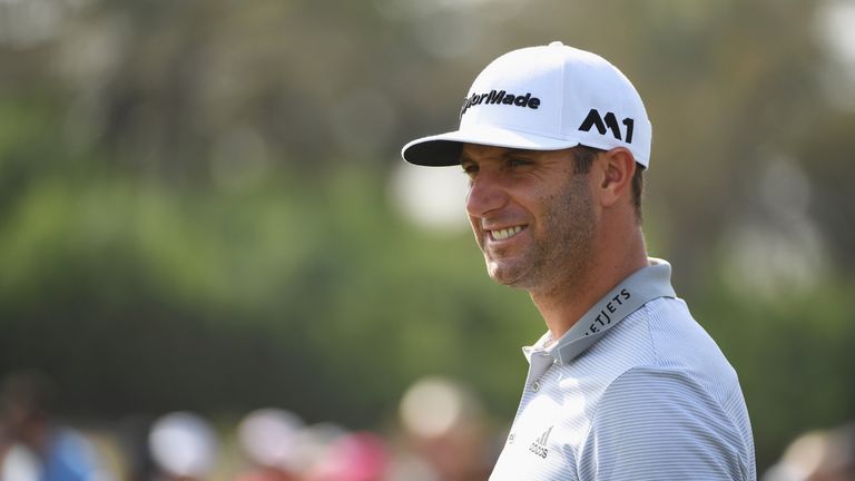 ABU DHABI, UNITED ARAB EMIRATES - JANUARY 21:  Dustin Johnson of the United States looks on from the 8th green during the third round of the Abu Dhabi HSBC