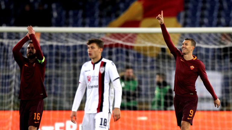 ROME, ITALY - JANUARY 22:  Edin Dzeko of AS Roma celebrates after scoring the opening goal during the Serie A match between AS Roma and Cagliari Calcio at 