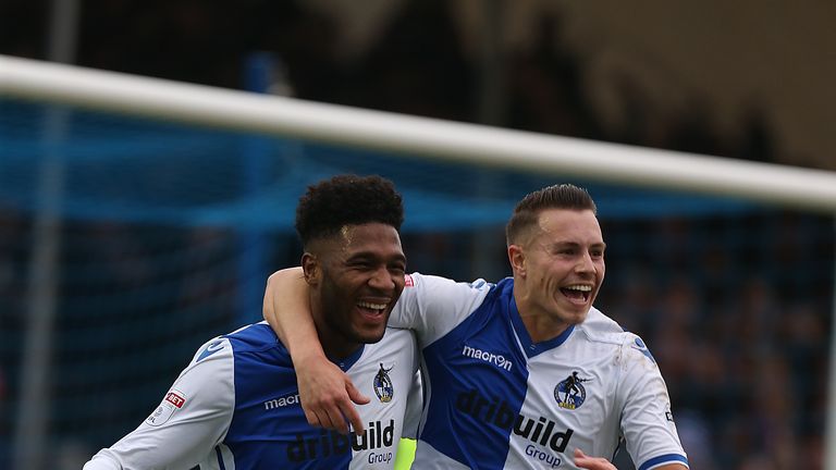 Bristol Rovers striker Ellis Harrison celebrates completing his hat-trick against Northampton with team mate Billy Bodin