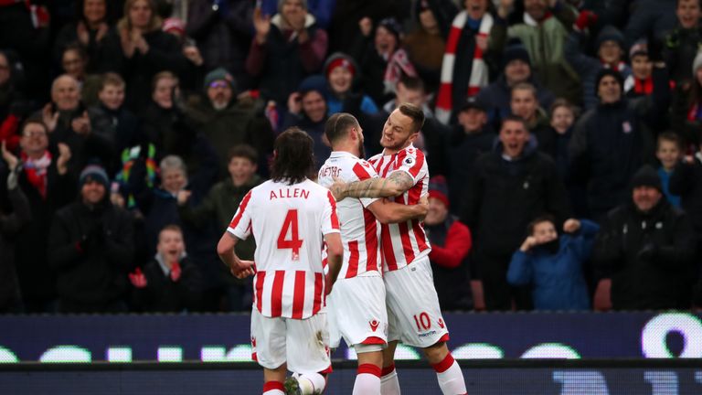 Stoke City's Erik Pieters (centre) and Marko Arnautovic celebrate after Manchester United's Juan Mata scores an own goal during the Premier League match at