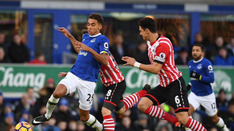 Dominic Calvert-Lewin of Everton and Jose Fonte of Southampton (R) battle for possession