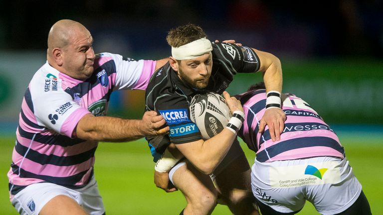  7/1/2017.Glasgow Warriors vs Cardiff Blues.Glasgow Warriors' Finn Russell is tackled by Willis Halaholo and Anton Peikrishvili of Cardiff Blues.