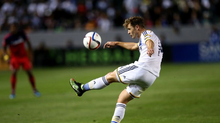 Robbie Rogers #14 of the Los Angeles Galaxy clears the ball against the Chicago Fire at StubHub Center on March 6, 2015