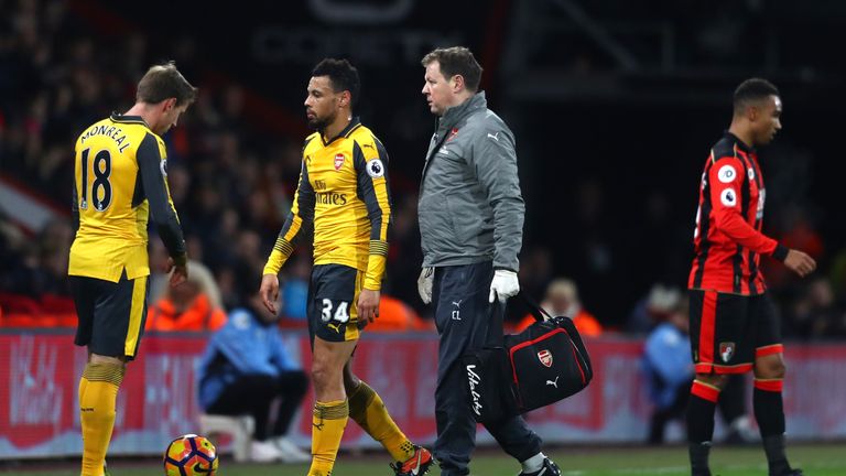 Francis Coquelin (second left) was forced off injured against Bournemouth after 28 minutes