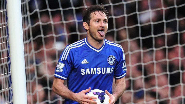 Chelsea's English midfielder Frank Lampard celebrates after scoring Chelsea's second goal from the rebound after Stoke City's Bosnian goalkeeper Asmir Bego