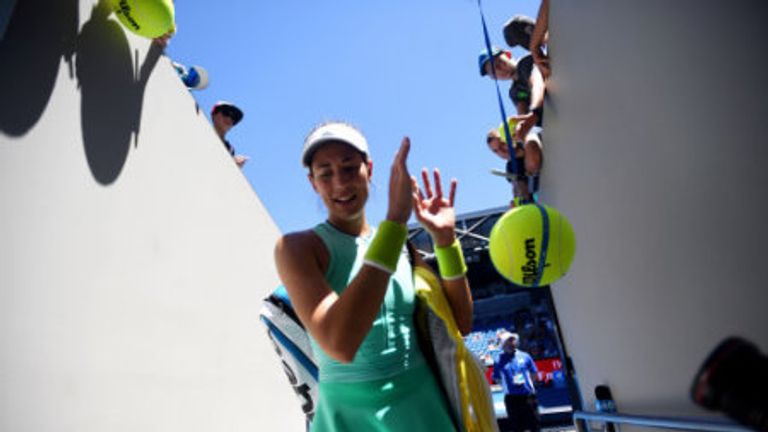 Garbine Muguruza greets the fans after his first round win
