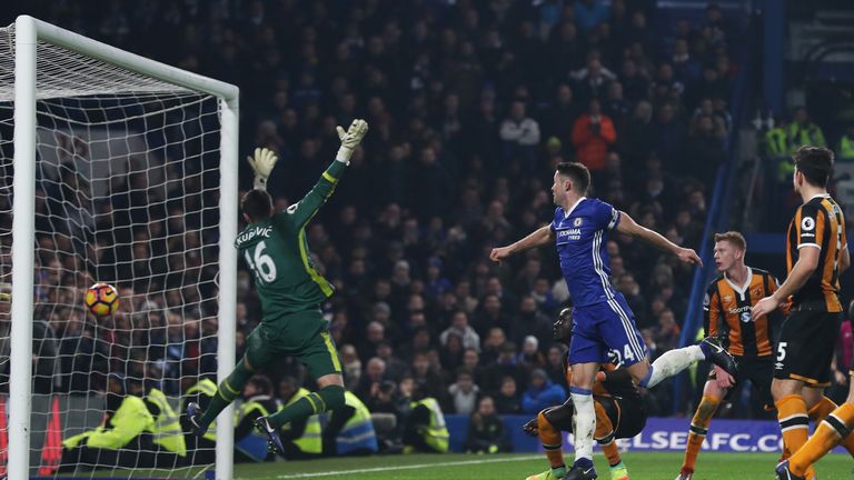 LONDON, ENGLAND - JANUARY 22:  Gary Cahill (2nd L) of Chelsea heads the ball to score his side's second goal past Eldin Jakupovic (1st L) of Hull City duri