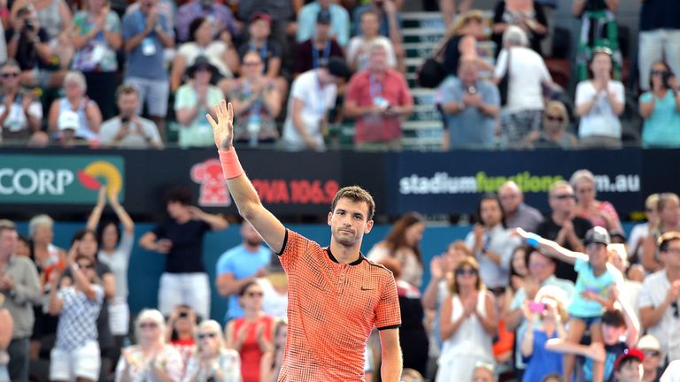 BRISBANE, AUSTRALIA - JANUARY 07:  Grigor Dimitrov of Bulgaria celebrates victory against Milos Raonic of Canada after their semi final match on day seven 