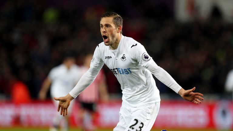 Gylfi Sigurdsson celebrates after giving Swansea a 2-1 lead against Southampton