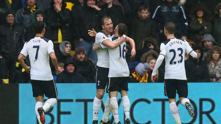 WATFORD, ENGLAND - JANUARY 01:  Harry Kane of Tottenham Hotspur (2L) celebrates with Kieran Trippier (16) as he scores their first goal during the Premier 