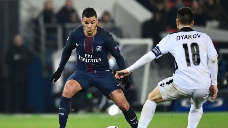 Paris Saint-Germain's French forward Hatem Ben Arfa (L) vies for the ball with Ludogorets' Bulgarian midfielder Svetoslav Dyakov during the UEFA Champions 