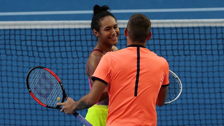 PERTH, AUSTRALIA - JANUARY 04: Heather Watson and Dan Evans of Great Britain talk inbetween points in the mixed doubles match against Kristina Mladenovic a