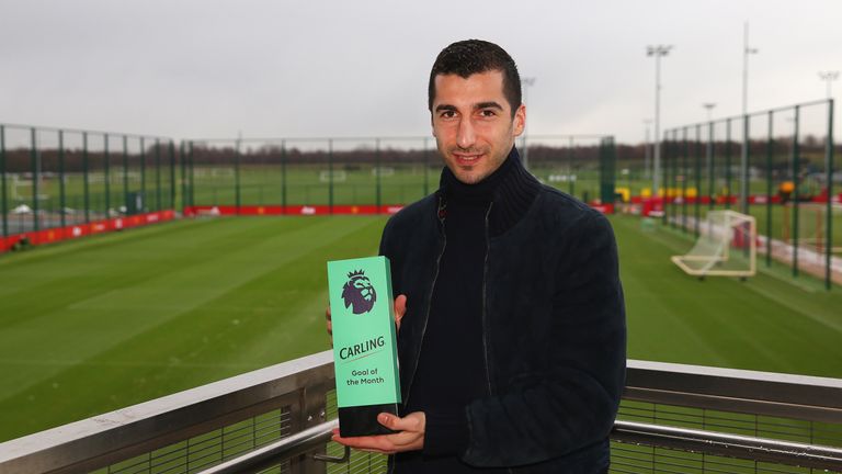 Manchester United's Henrikh Mkhitaryan of Manchester United is presented with the Premier League goal of the month award for December