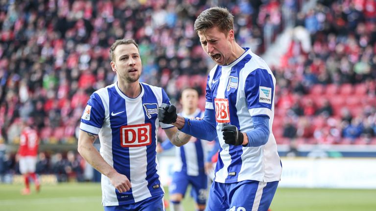 Jens Hegeler (R) celebrates scoring for Hertha Berlin