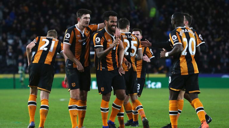 HULL, ENGLAND - JANUARY 14: Tom Huddlestone of Hull City (C) celebrates his side third goal with his Hull City team mates during the Premier League match b