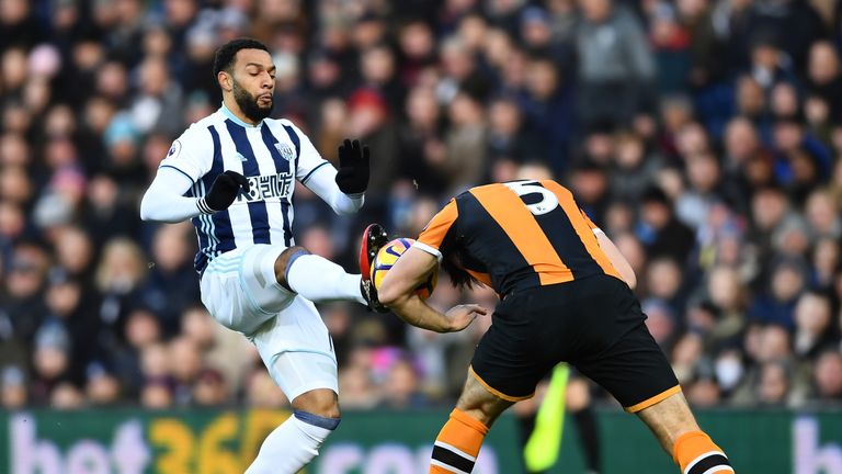 Matt Phillips of West Brom challenges Hull's Harry Maguire