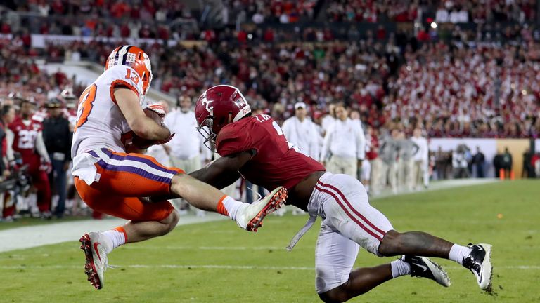 TAMPA, FL - JANUARY 09:  Wide receiver Hunter Renfrow #13 of the Clemson Tigers makes a 2-yard game-winning touchdown reception against defensive back Tony