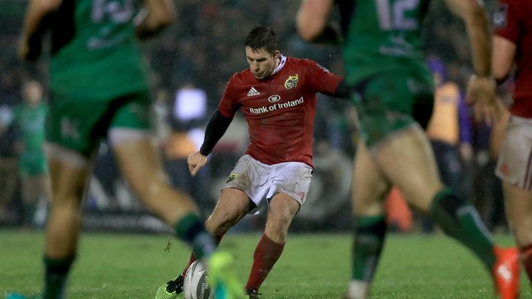 Munster's Ian Keatley kicks a drop goal