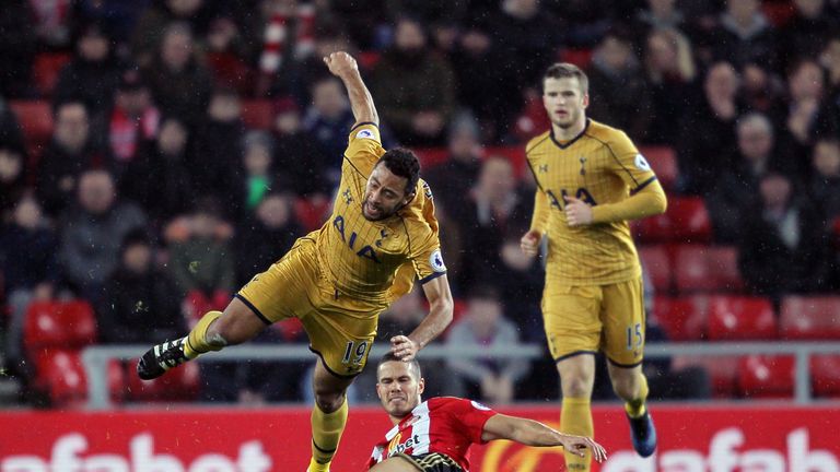 Sunderland's Jack Rodwell tackles Tottenham Hotspur's Mousa Dembele, resulting in a yellow card during the Premier League match at the Stadium of Light, Su