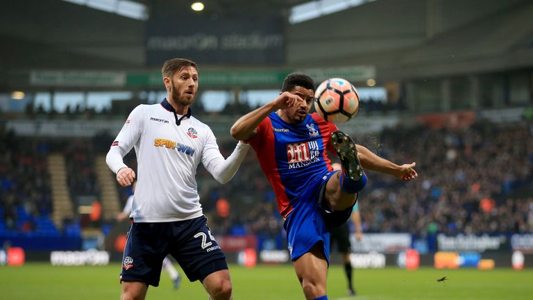 Bolton Wanderers' James Henry (Left) and Crystal Palace's Zeki Fryers battle for the ball during the Emirates FA Cup, Third Round match at the Macron Stadi