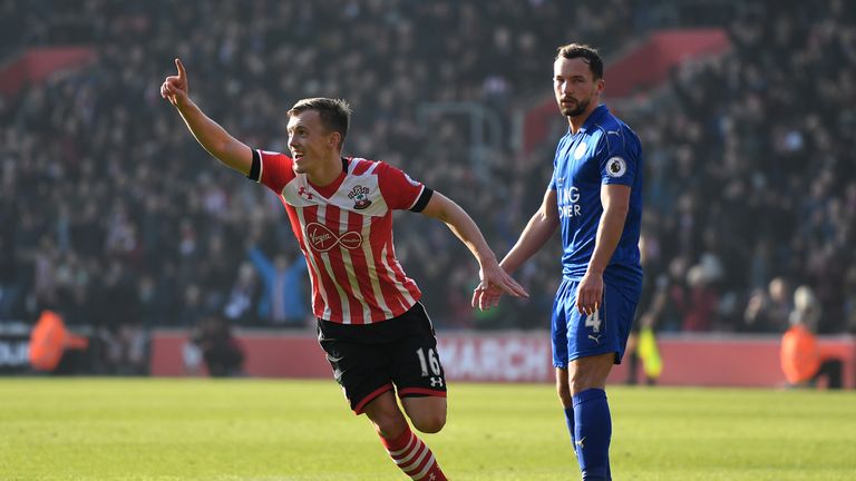 SOUTHAMPTON, ENGLAND - JANUARY 22:  Goalscorer James Ward-Prowse ofSouthampton turns to celebrate past a dejected Danny Drinkwater of Leicester during the 