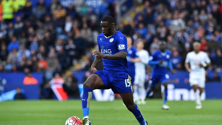 Leicester City's Ghanaian striker Jeff Schlupp runs with the ball on his way to setting up Leicester's third goal during the English Premier League footbal