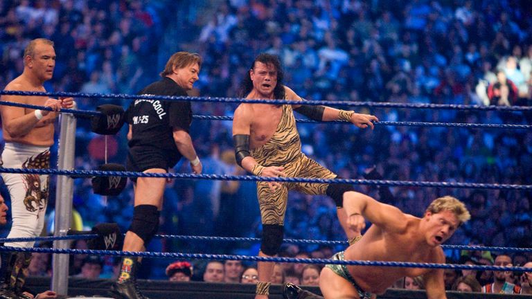 HOUSTON, TX - APRIL 5:  (L-R) Former professional wrestlers Ricky "The Dragon" Steamboat and "Rowdy Roddy Piper look on as Jimmy "Superfly" Snuka steps int