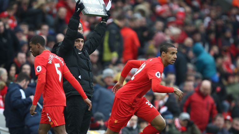 LIVERPOOL, ENGLAND - JANUARY 21: Joel Matip of Liverpool (R) comes on for Georginio Wijnaldum of Liverpool (L) during the Premier League match between Live