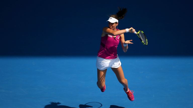 Johanna Konta plays a forehand in her semi final match against Angelique Kerber