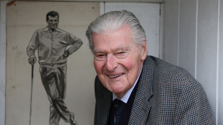 LYNDHURST, ENGLAND - APRIL 18:  John Jacobs of England poses for a photograph next to a charcoal drawing of himself at his home on April 18, 2013 in Lyndhu