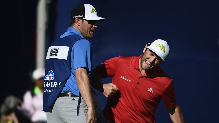 Jon Rahm of Spain celebrates his eagle putt on the 18th hole during the final round of the Farmers Insurance Open