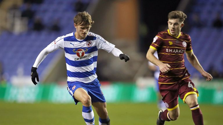 Reading's John Swift (left) and Queens Park Rangers' Ryan Manning (right) in action during the Sky Bet Championship match at The Madejski Stadium, Reading.