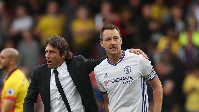 WATFORD, ENGLAND - AUGUST 20:  Manager Antonio Conte and John Terry of Chelsea celebrate their victory during the Premier League match between Watford and 