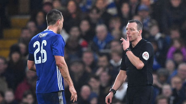 LONDON, ENGLAND - JANUARY 08:  John Terry of Chelsea is shown a red card by referee Kevin Friend during The Emirates FA Cup Third Round match between Chels