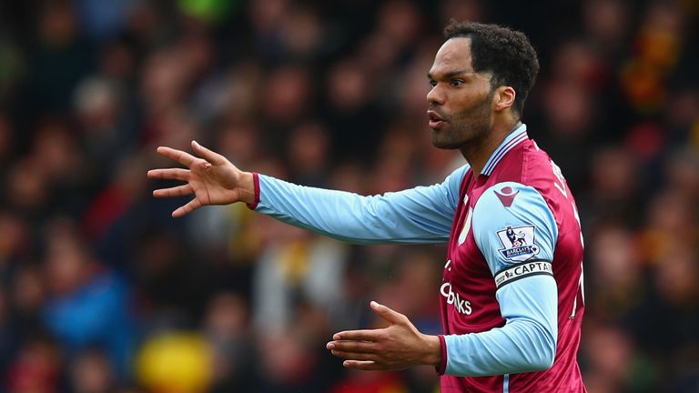 Joleon Lescott of Aston Villa reacts during the Barclays Premier League match between Watford and Aston Villa at Vicarage Road