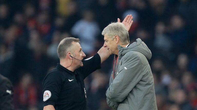 Referee Jon Moss sends Arsenal manager Arsene Wenger  to the stands 