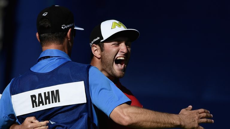 Jon Rahm of Spain celebrates his eagle putt on the 18th hole during the final round of the Farmers Insurance Open at Torrey Pines