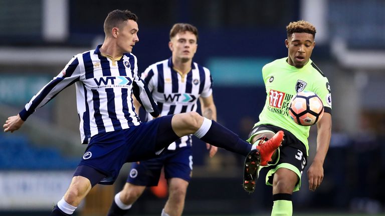 Millwall's Ben Thompson (left) and AFC Bournemouth's Jordon Ibe battle for the ball during the Emirates FA Cup, Third Round match at The Den, London.
