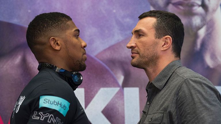 British boxer Anthony Joshua(L) and Wladimir Klitschko of the Ukraine meet during a news conference January 31, 2017 in Madison Square Garden in New York.