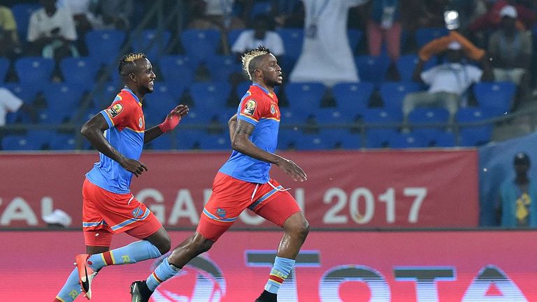 Democratic Republic of the Congo's forward Junior Kabananga (R) celebrates with midfielder Merveille Bokadi