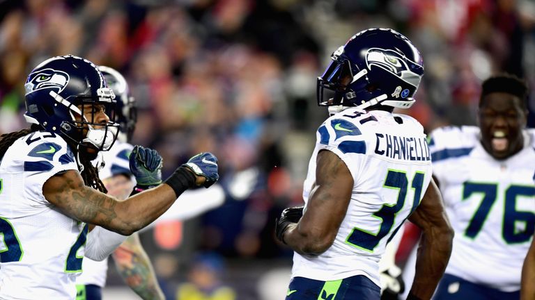 FOXBORO, MA - NOVEMBER 13:  Kam Chancellor #31 and Richard Sherman #25 of the Seattle Seahawks reacts during the fourth quarter of a game against the New E