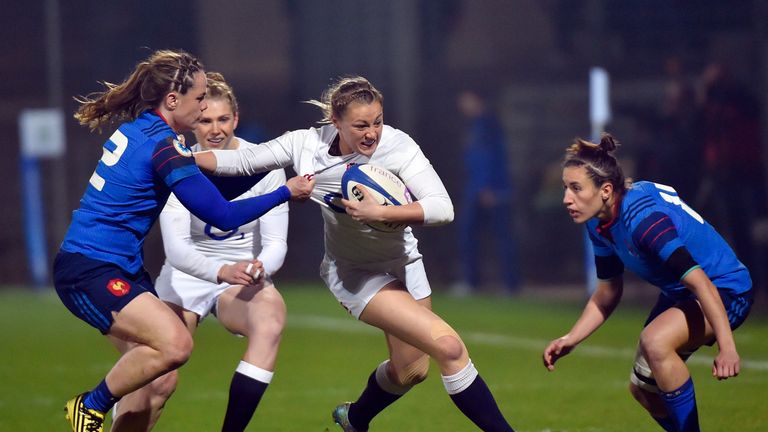 England's fullback Katie Mason attacks France