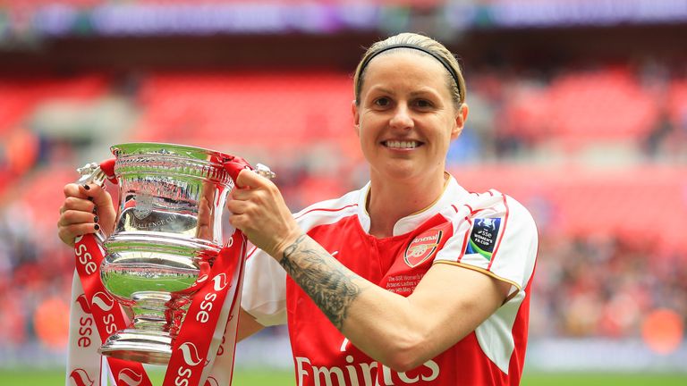 Arsenal's Kelly Smith celebrates with the the SSE Women's FA Cup after beating Chelsea in the final